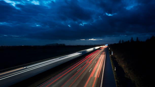 istock Traffic on highway - long exposure, motion blur 900310254