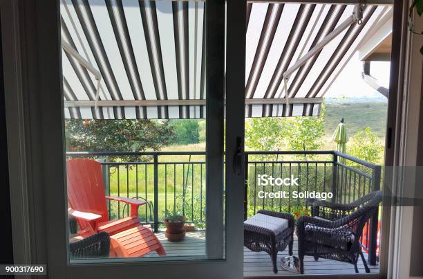 Looking Out To A Cool Awning Shaded Deck Stock Photo - Download Image Now - Awning, Patio, Deck