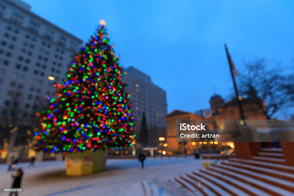 Pioneer Courthouse in Pioneer Square with Christmas tree blurred bokeh abstract background of Christmas or xmas tree at Pioneer Courthouse Square Christmas Stock Photo