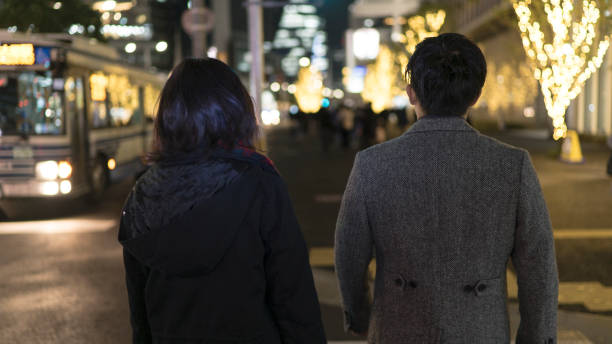 istock Young couple walking winter town 900353582