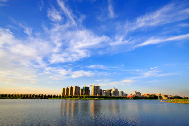 istock Urban construction scenery at the water's edge 900356648