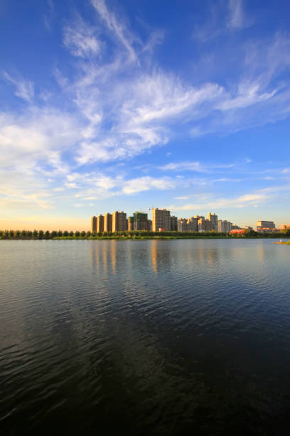 istock Urban construction scenery at the water's edge 900356654