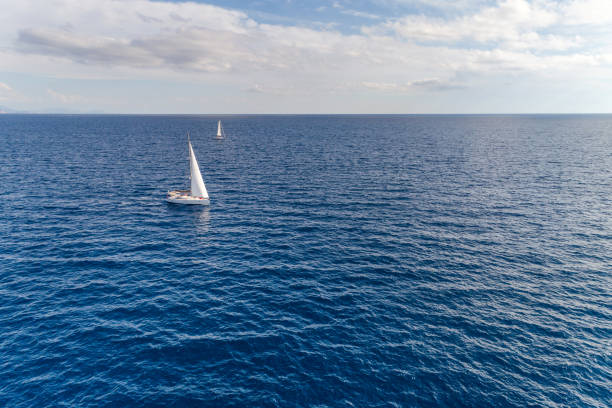 istock White yacht under a white sail. Montenegro. 900362818