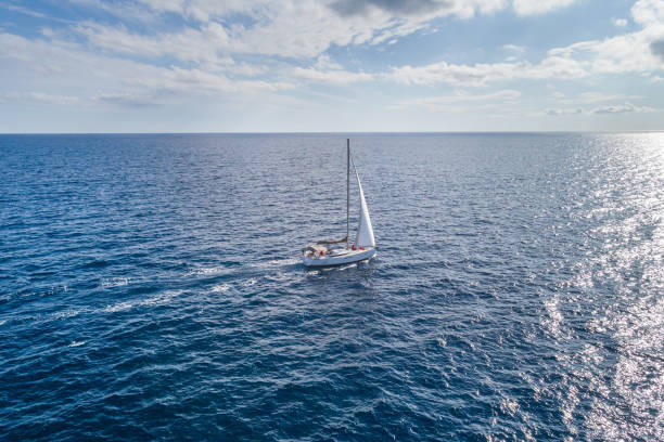 istock White yacht under a white sail. Montenegro. 900362832