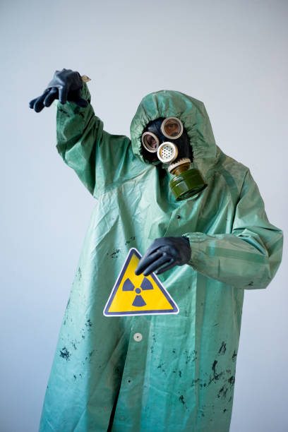 istock People in gas masks 900362992