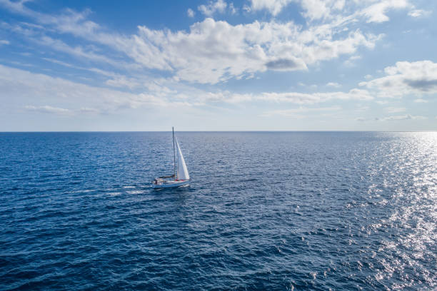 istock White yacht under a white sail. Montenegro. 900362994