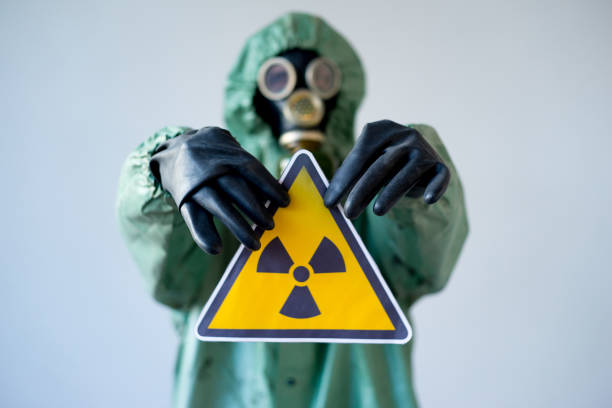 istock People in gas masks 900363020