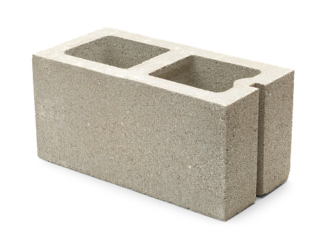 Single Gray Concrete Cinder Block Isolated on White Background.