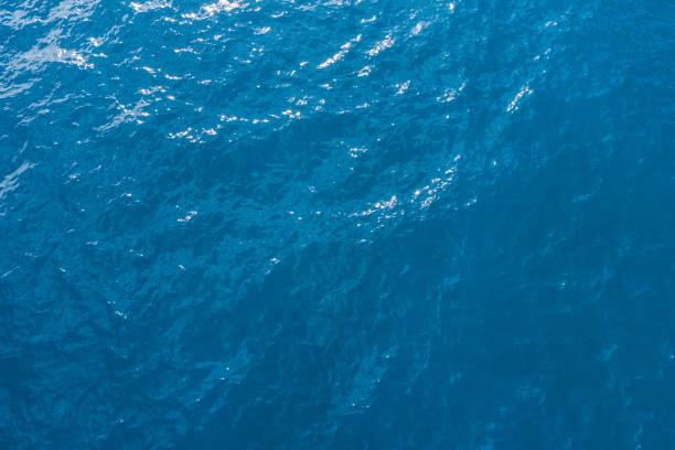istock Aerial view on turquoise waves, water surface 900363878