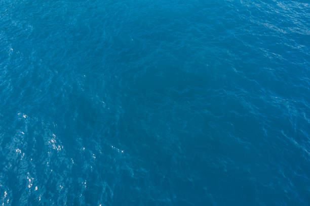 istock Aerial view on turquoise waves, water surface texture 900364136