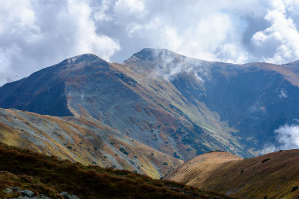 slovakian carpathian mountains in autumn. nice day for hiking. view from above the clouds