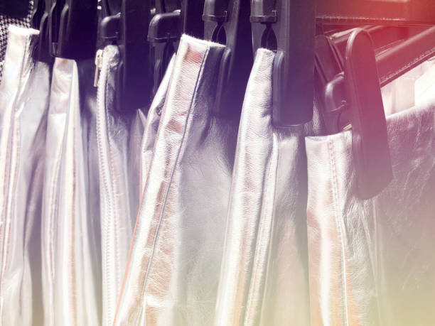 istock Modern clothes in a shop on a hanger. 900385404