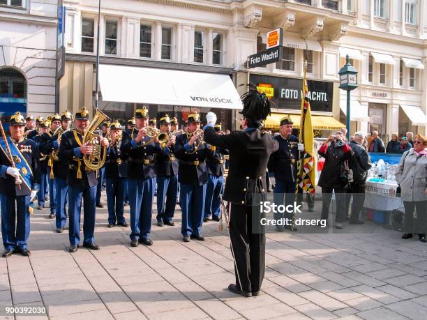 Military Brass Orchestra Plays At Street In Vienna Stock Photo - Download Image Now - Marching Band, Musical Conductor, Army