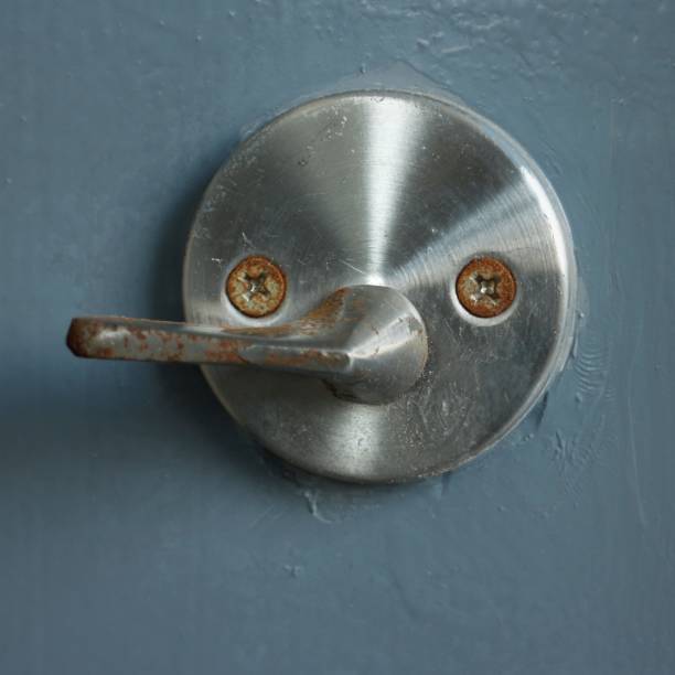 istock Anthropomorphic Door Lock Handle on Blue Door 900400606