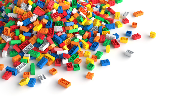 Pile of colored toy blocks isolated on white background. 3D Rendering