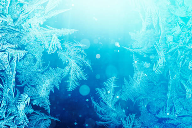 istock Defocused blue background with ice flowers 900403296
