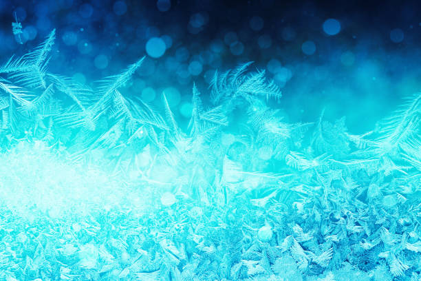istock Defocused blue background with ice flowers 900403576