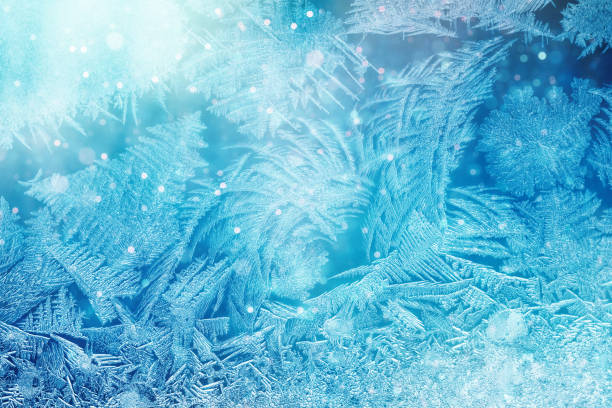istock Defocused blue background with ice flowers 900404128