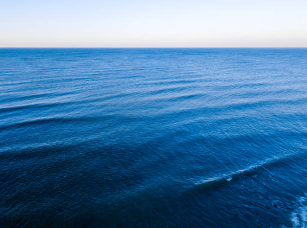 istock Aerial top view of blue sea surface 900408042