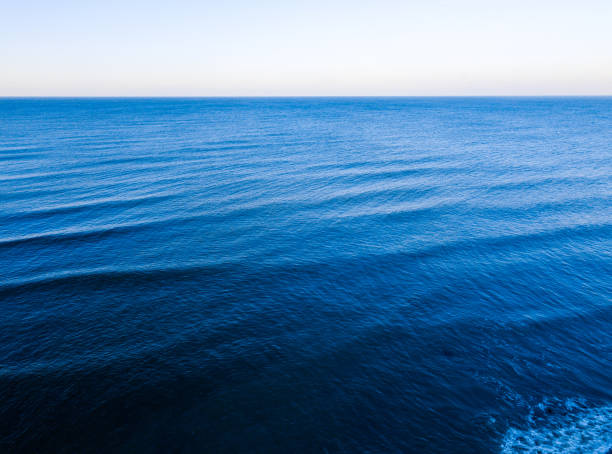 istock Aerial top view of blue sea surface 900408064