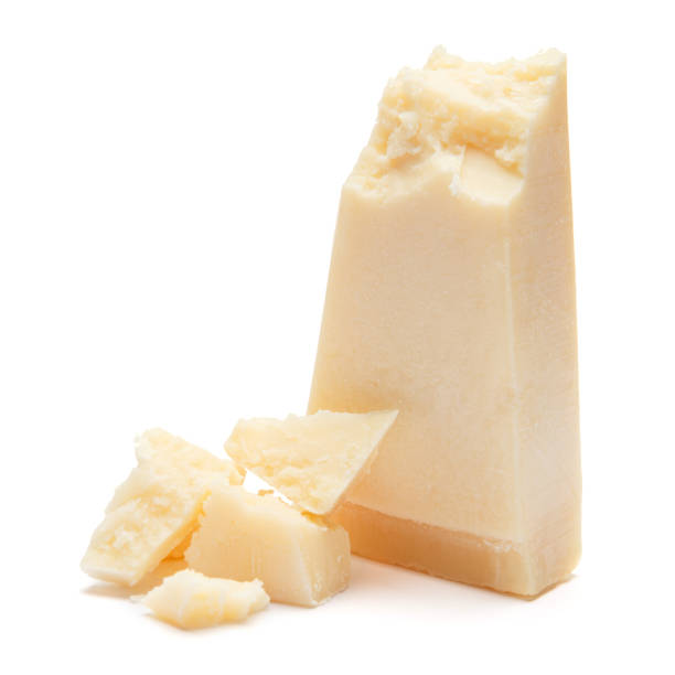 istock pieces of Parmesan cheese on white background 900411778