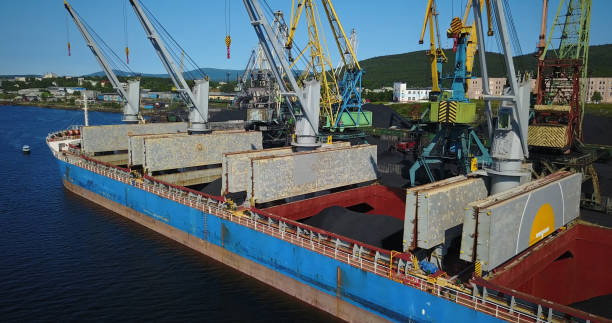 istock Cargo Ship in the Port Aerial View from Drone 900420586