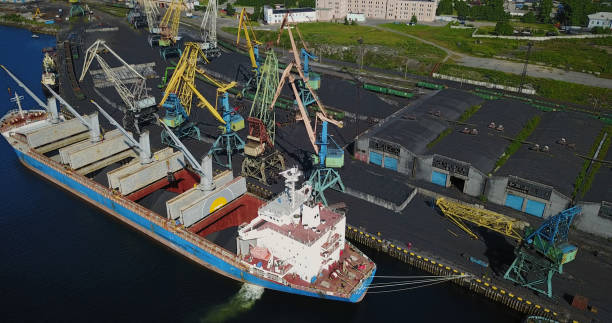 istock Cargo Ship in the Port Aerial View from Drone 900420616
