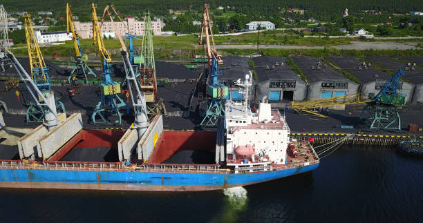 istock Cargo Ship in the Port Aerial View from Drone 900420634
