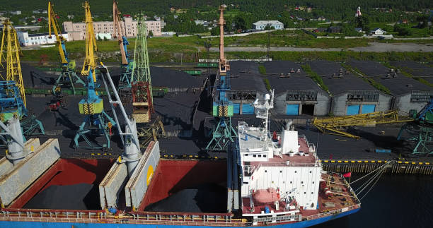istock Cargo Ship in the Port Aerial View from Drone 900420640