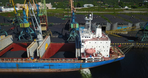 istock Cargo Ship in the Port Aerial View from Drone 900420644