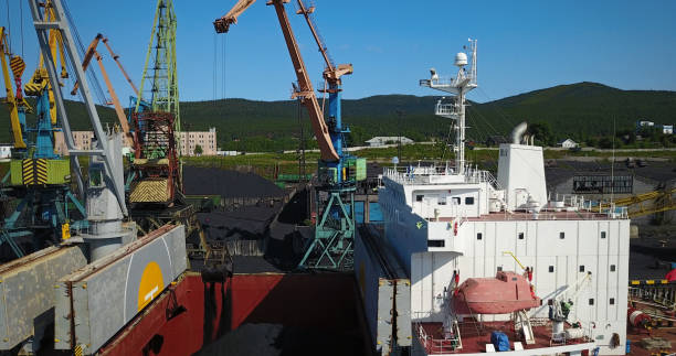 istock Cargo Ship in the Port Aerial View from Drone 900420646