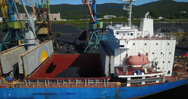 istock Cargo Ship in the Port Aerial View from Drone 900420650