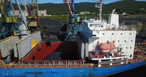 istock Cargo Ship in the Port Aerial View from Drone 900420658