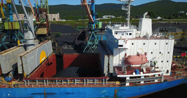 istock Cargo Ship in the Port Aerial View from Drone 900420662
