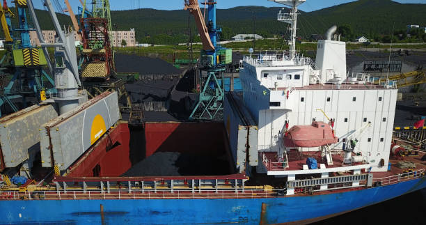 istock Cargo Ship in the Port Aerial View from Drone 900420670
