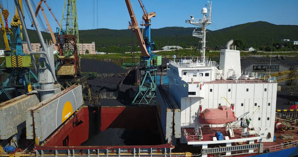 istock Cargo Ship in the Port Aerial View from Drone 900420672