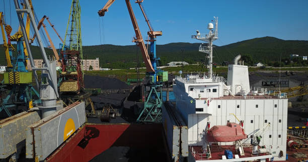 istock Cargo Ship in the Port Aerial View from Drone 900420676