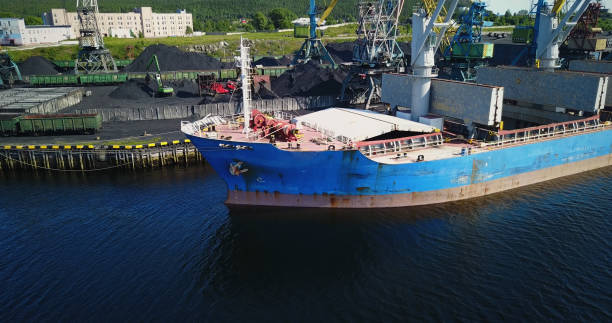istock Cargo Ship in the Port Aerial View from Drone 900420700