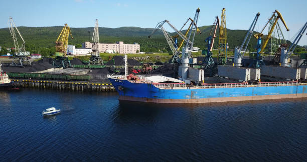 istock Cargo Ship in the Port Aerial View from Drone 900420714