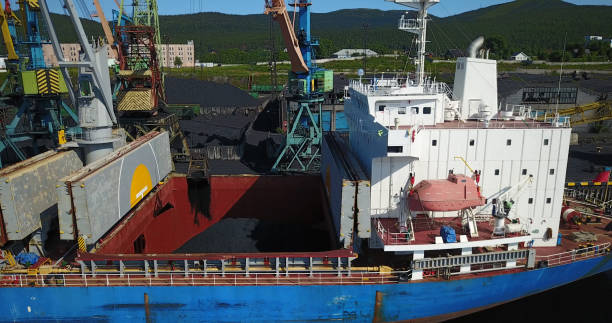 istock Cargo Ship in the Port Aerial View from Drone 900420716