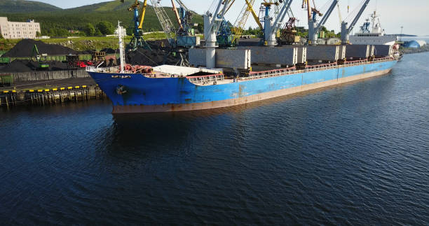 istock Cargo Ship in the Port Aerial View from Drone 900420754