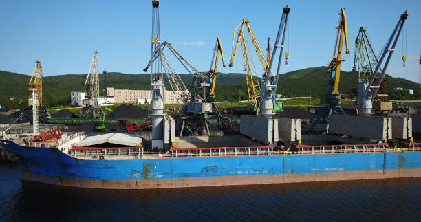 istock Cargo Ship in the Port Aerial View from Drone 900420764