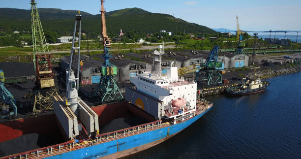 istock Cargo Ship in the Port Aerial View from Drone 900420774