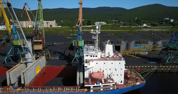 istock Cargo Ship in the Port Aerial View from Drone 900420776