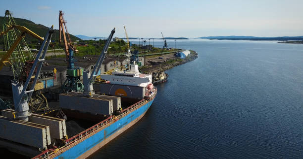 istock Cargo Ship in the Port Aerial View from Drone 900420778