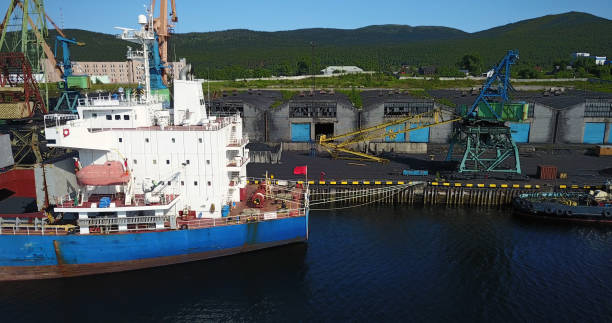 istock Cargo Ship in the Port Aerial View from Drone 900420790