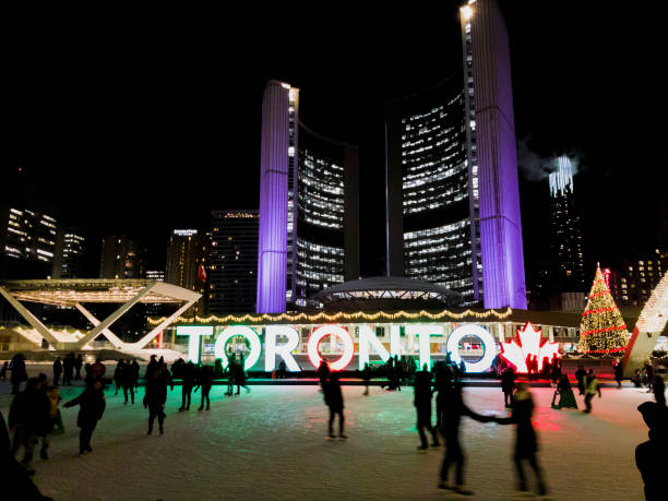 Toronto, Canada City Hall ice skating at night. stock photo