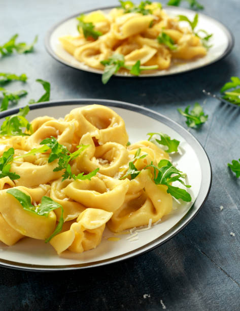 istock Ravioli with Parmesan and wild rocket on plate 900425002