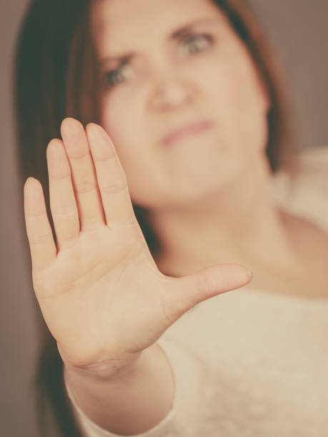 istock Angry apodicticity woman showing stop with hand 900427106
