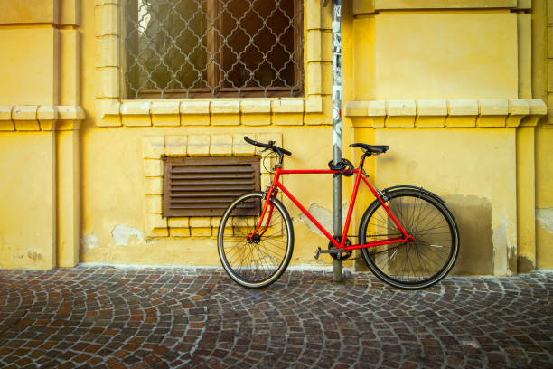 istock Bicycle standing on old street 900428716